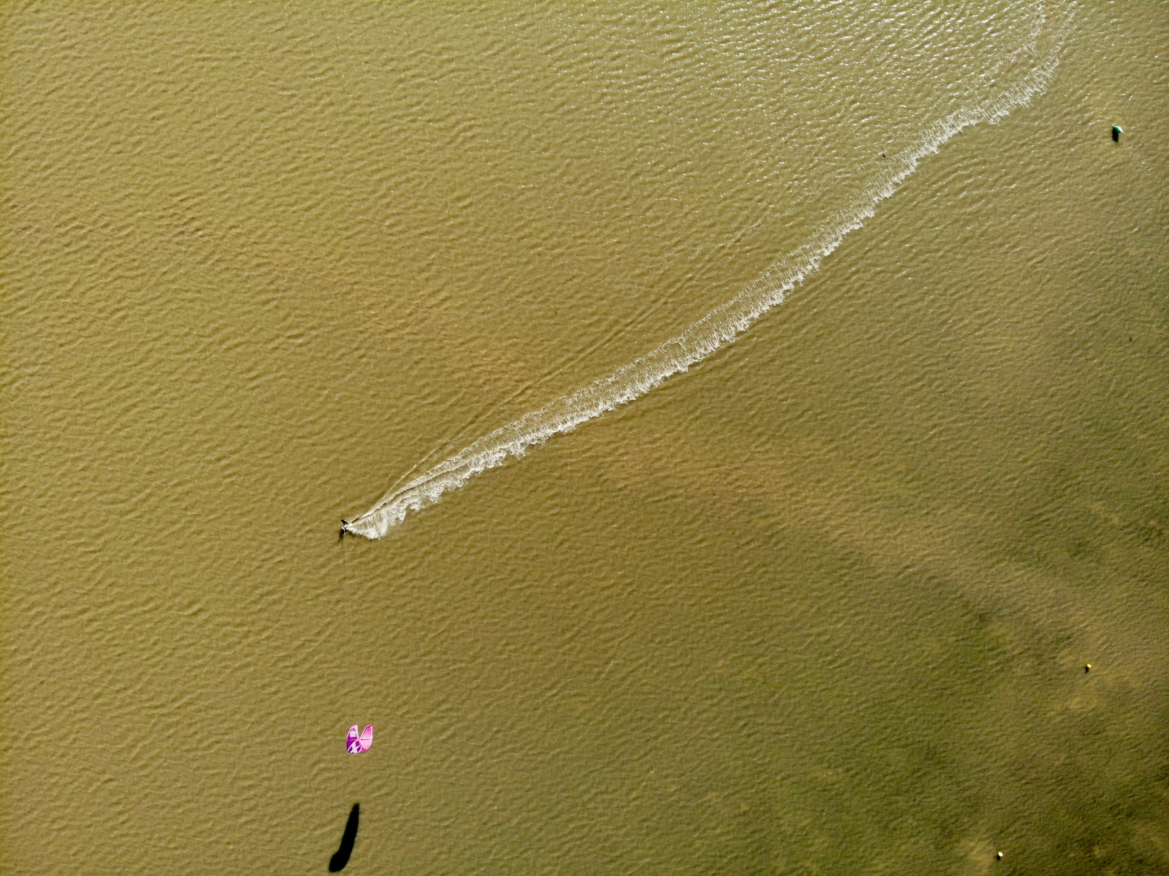 aerial view of boat on sea during daytime